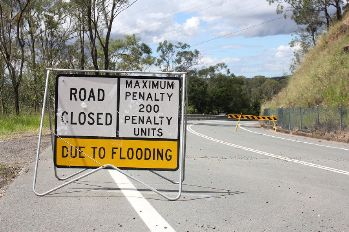 Road Closure Due to Flooding sign on a Brisbane road